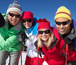 Skiers wearing sunglasses